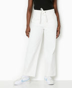 Jean baggy taille basse avec ceinture à nouer