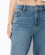 Jean straight taille haute bas coupés