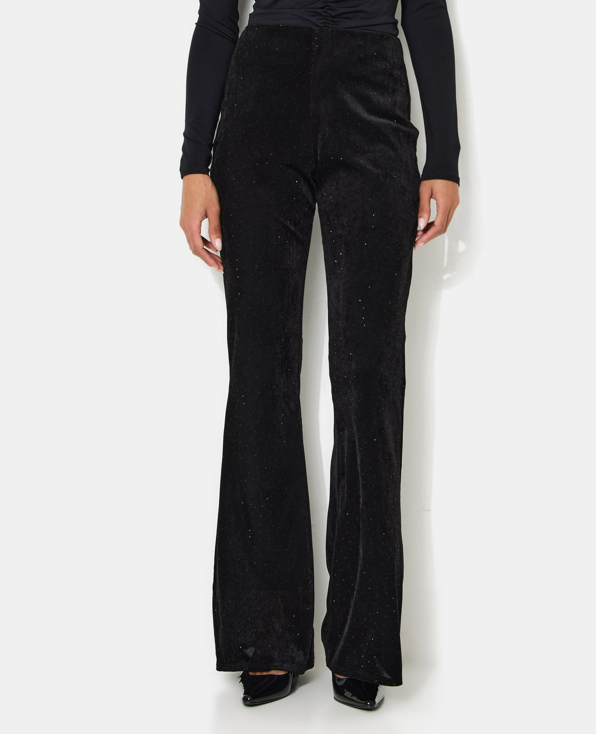 Pantalon flare en résille et velours avec strass