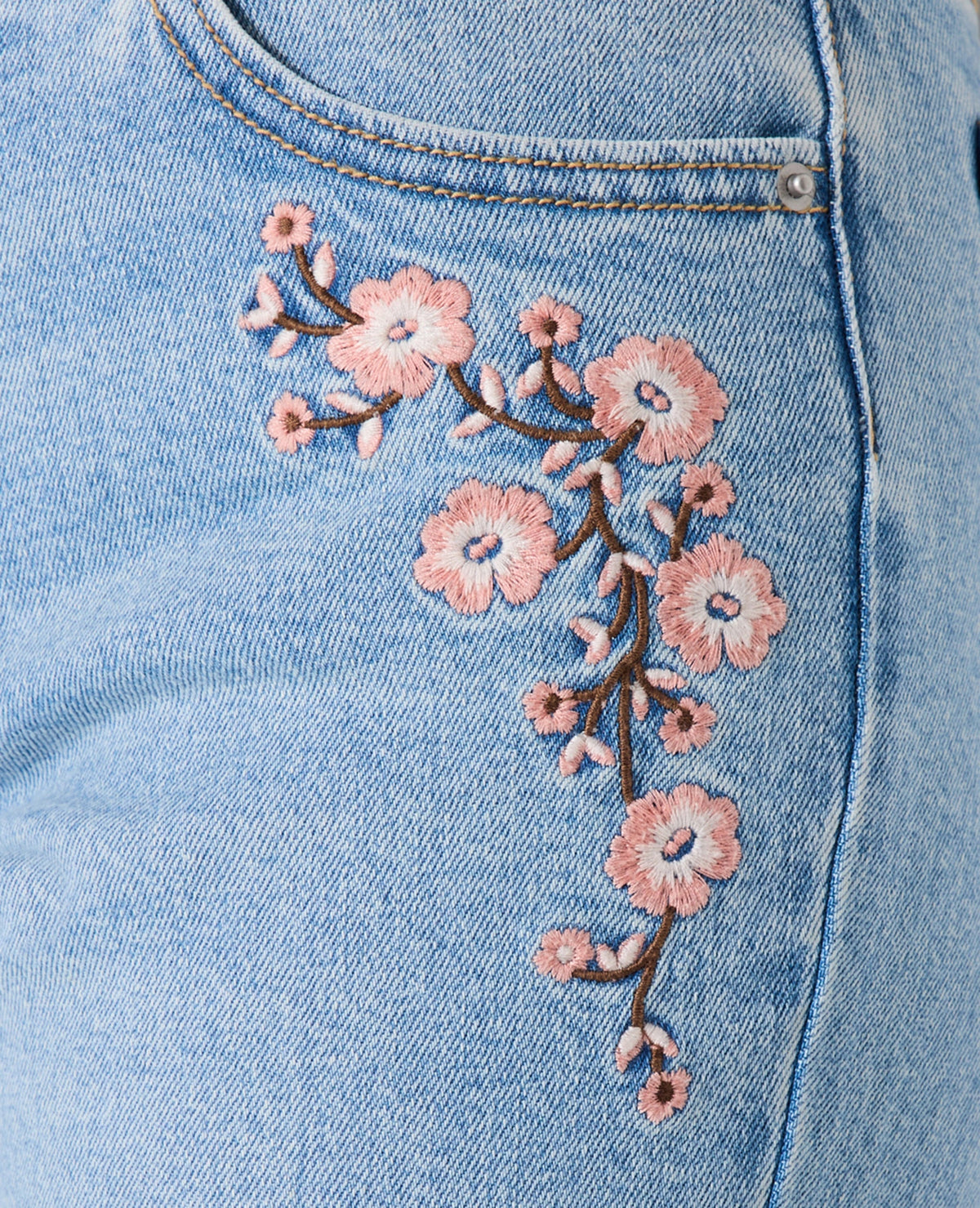 Jean flare taille basse avec broderies fleurs