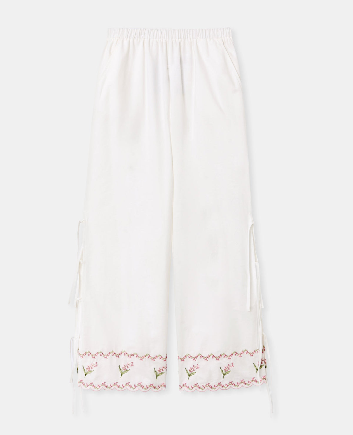Pantalon avec fleurs points de croix et nouettes