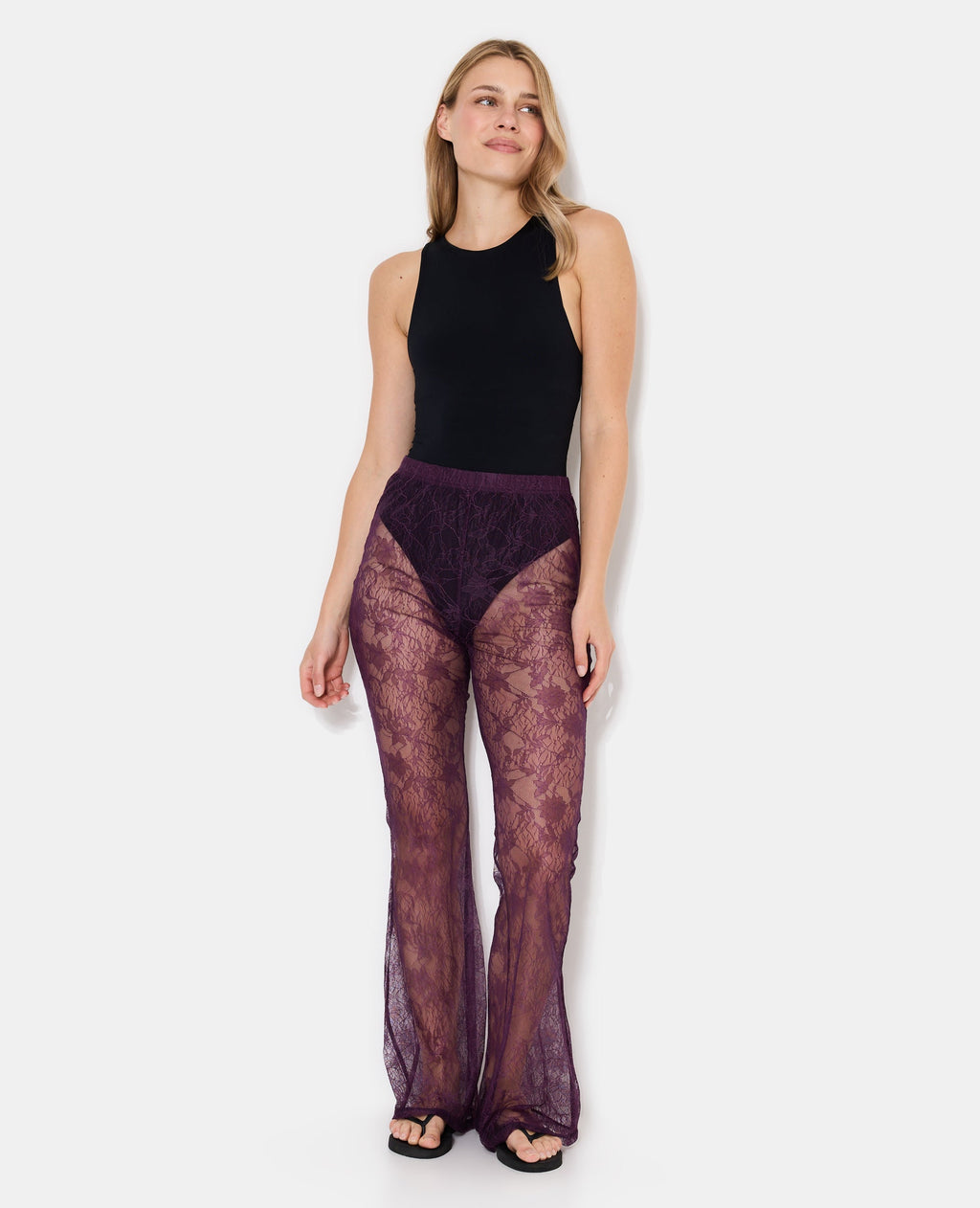 Pantalon flare en dentelle taille élastiquée