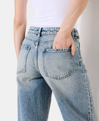 Jean wide taille medium avec œillets