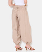 Pantalon bouffant en tissu satiné