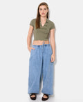 Jean large avec ceinture et bas de jambe élastiqués