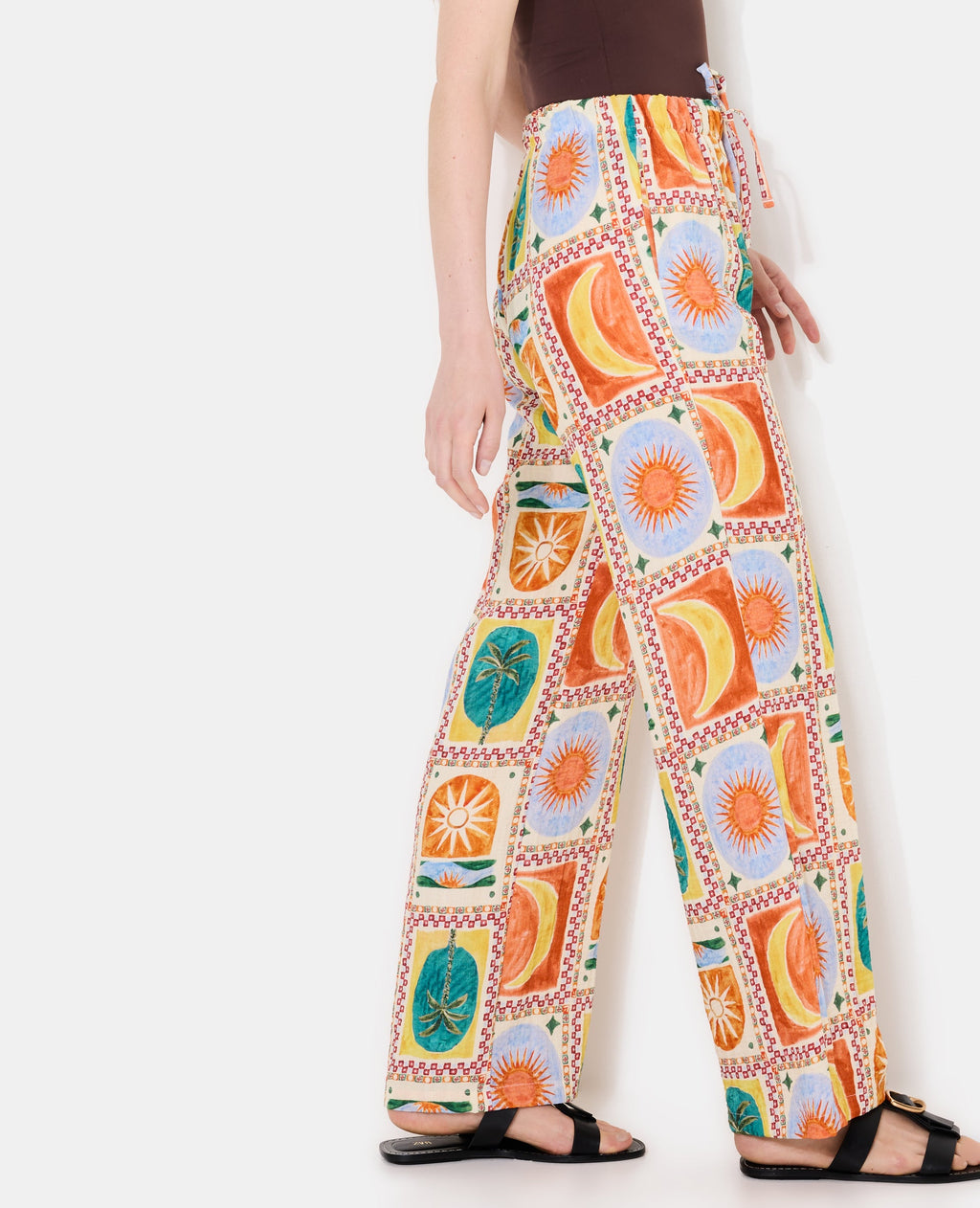 Pantalon ample motif soleils et lunes