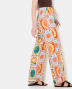 Pantalon ample motif soleils et lunes