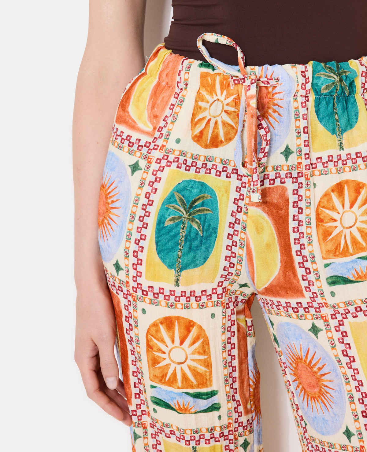 Pantalon ample motif soleils et lunes