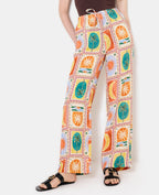 Pantalon ample motif soleils et lunes