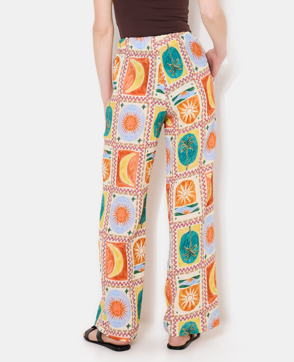 Pantalon ample motif soleils et lunes