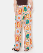 Pantalon ample motif soleils et lunes