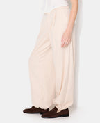 Pantalon bombacho avec rayures