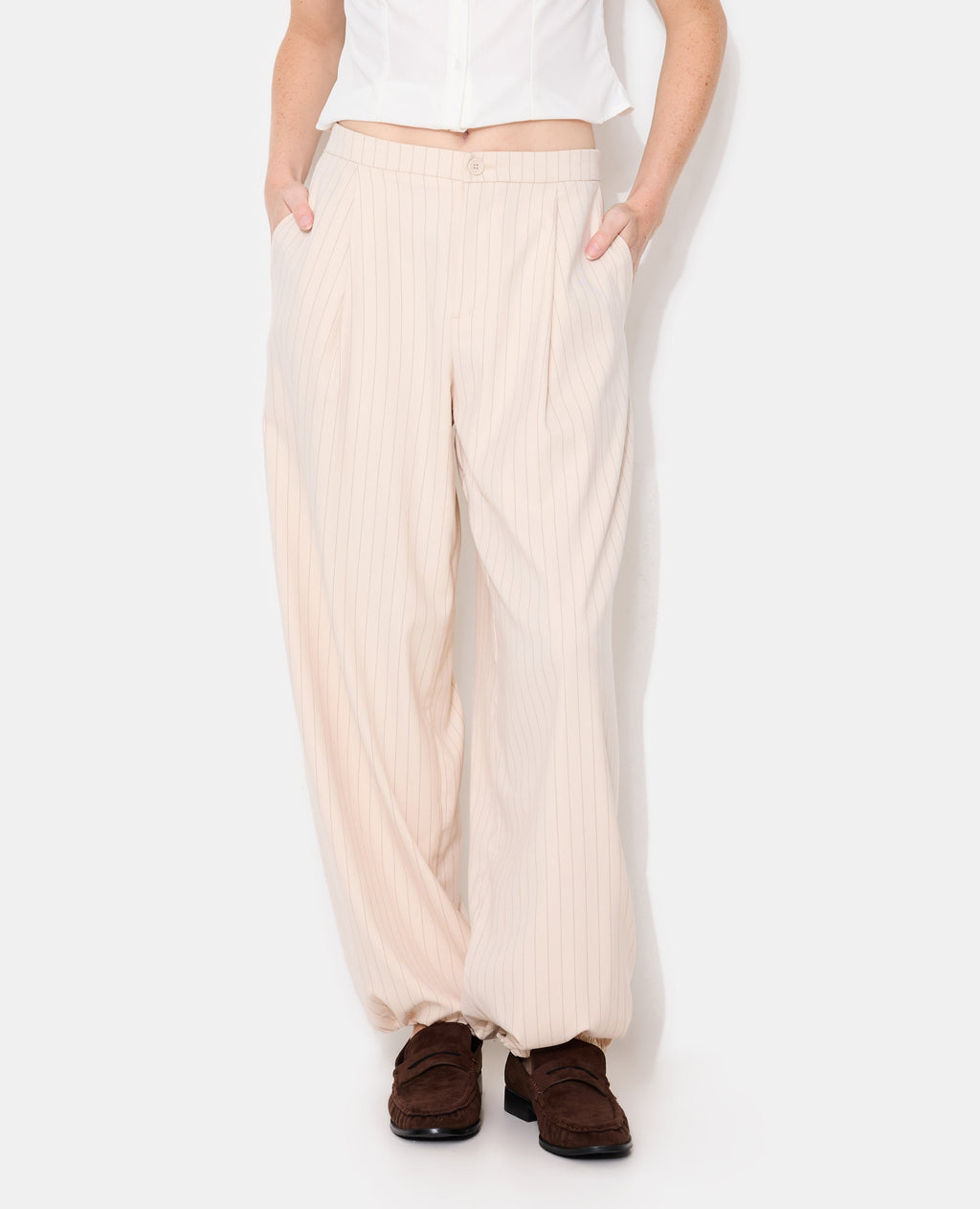 Pantalon bombacho avec rayures
