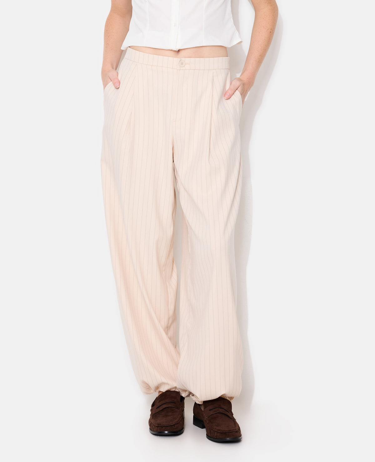 Pantalon bombacho avec rayures