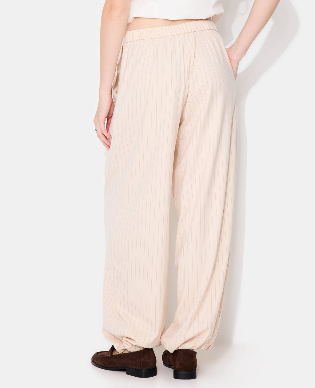 Pantalon bombacho avec rayures