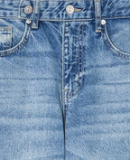 Jean wide taille basse avec patte boutonnée