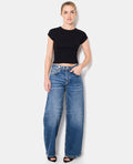 Jean wide taille basse avec patte boutonnée