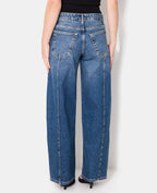 Jean wide taille basse avec patte boutonnée