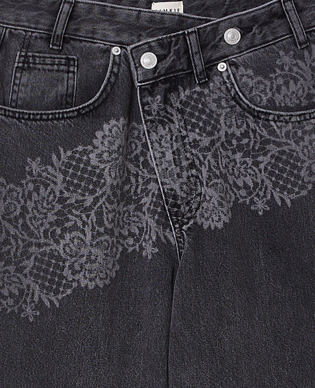 Jean taille décalée avec fleurs effet dentelle