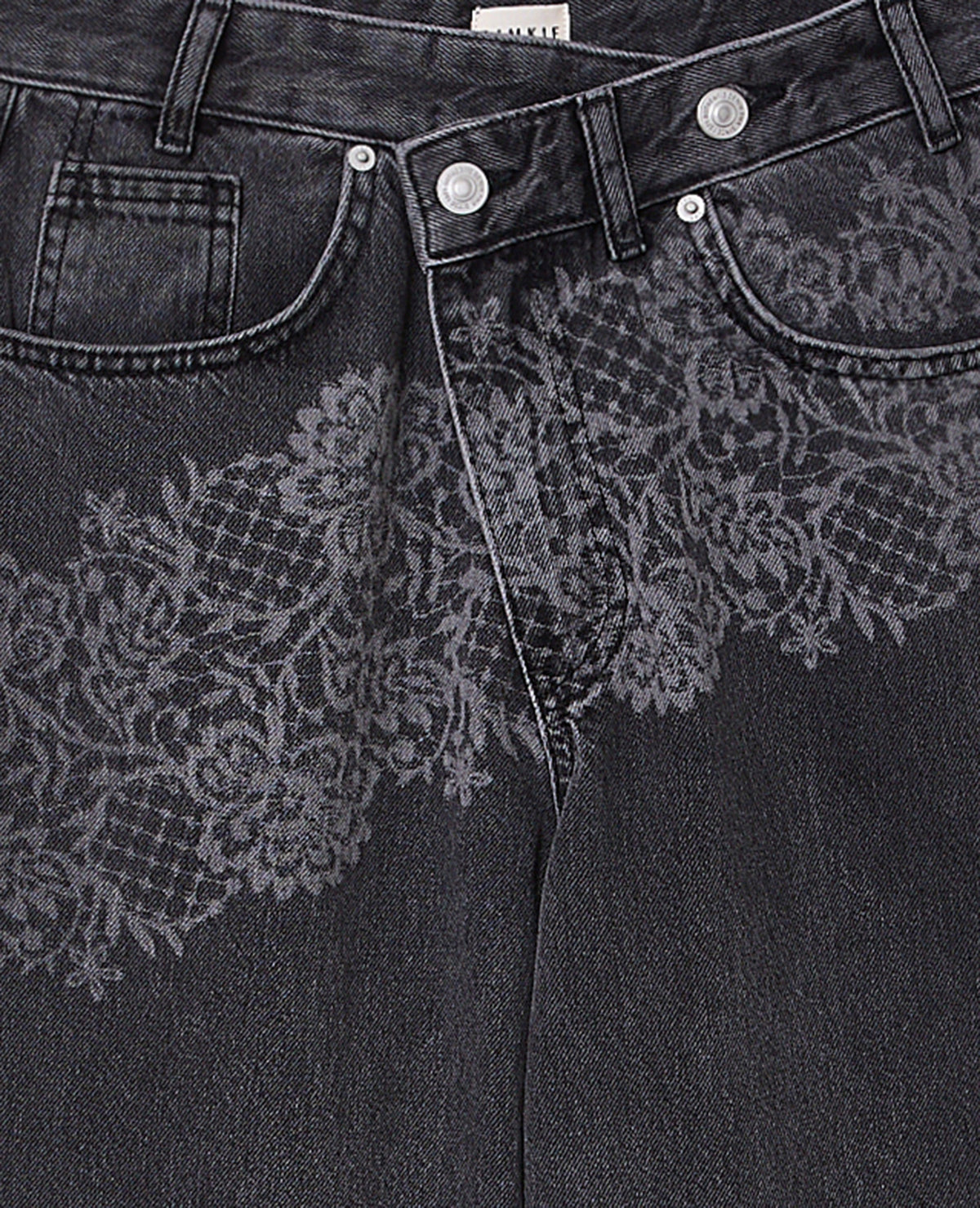 Jean taille décalée avec fleurs effet dentelle