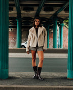 Blouson fausse fourrure avec grand col