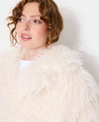 Manteau shaggy en fourrure bouclée