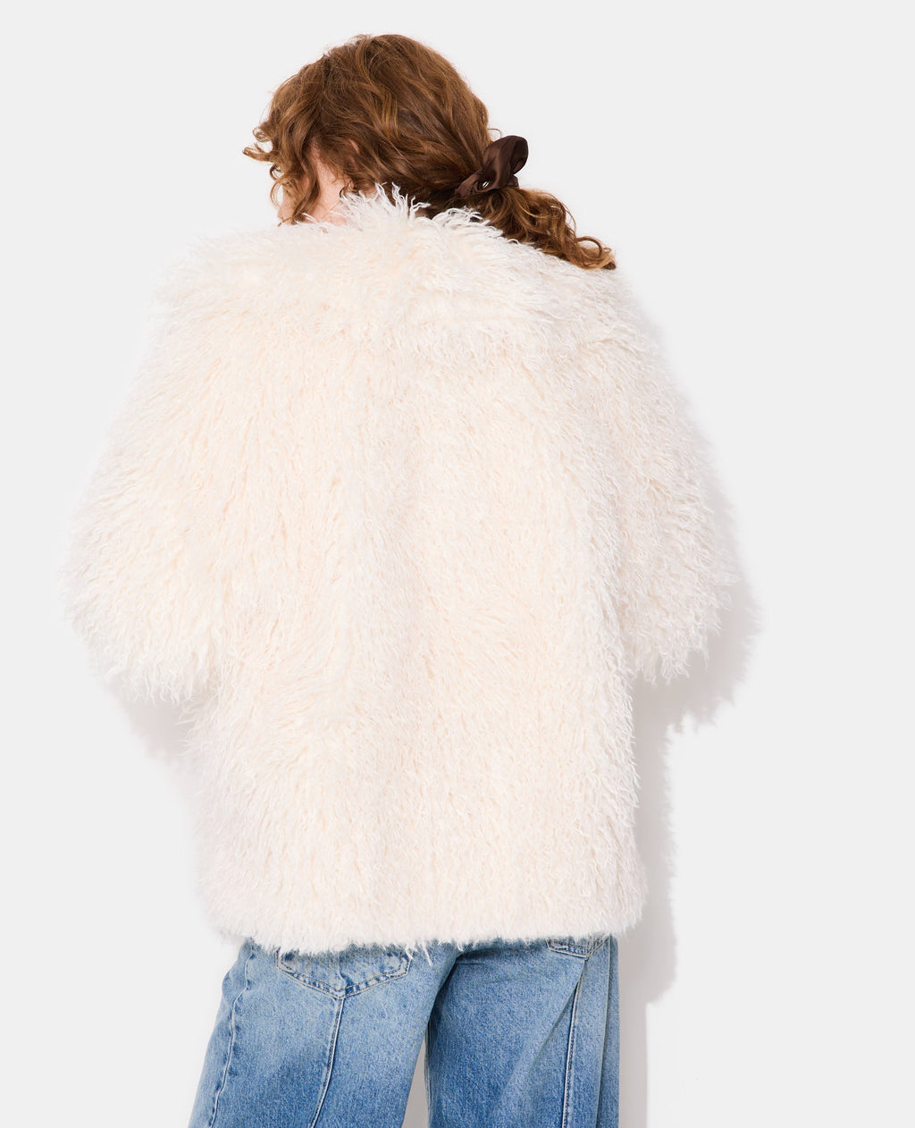 Manteau shaggy en fourrure bouclée