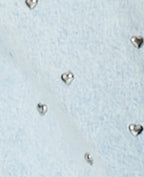 Veste en jean avec cœurs métalliques