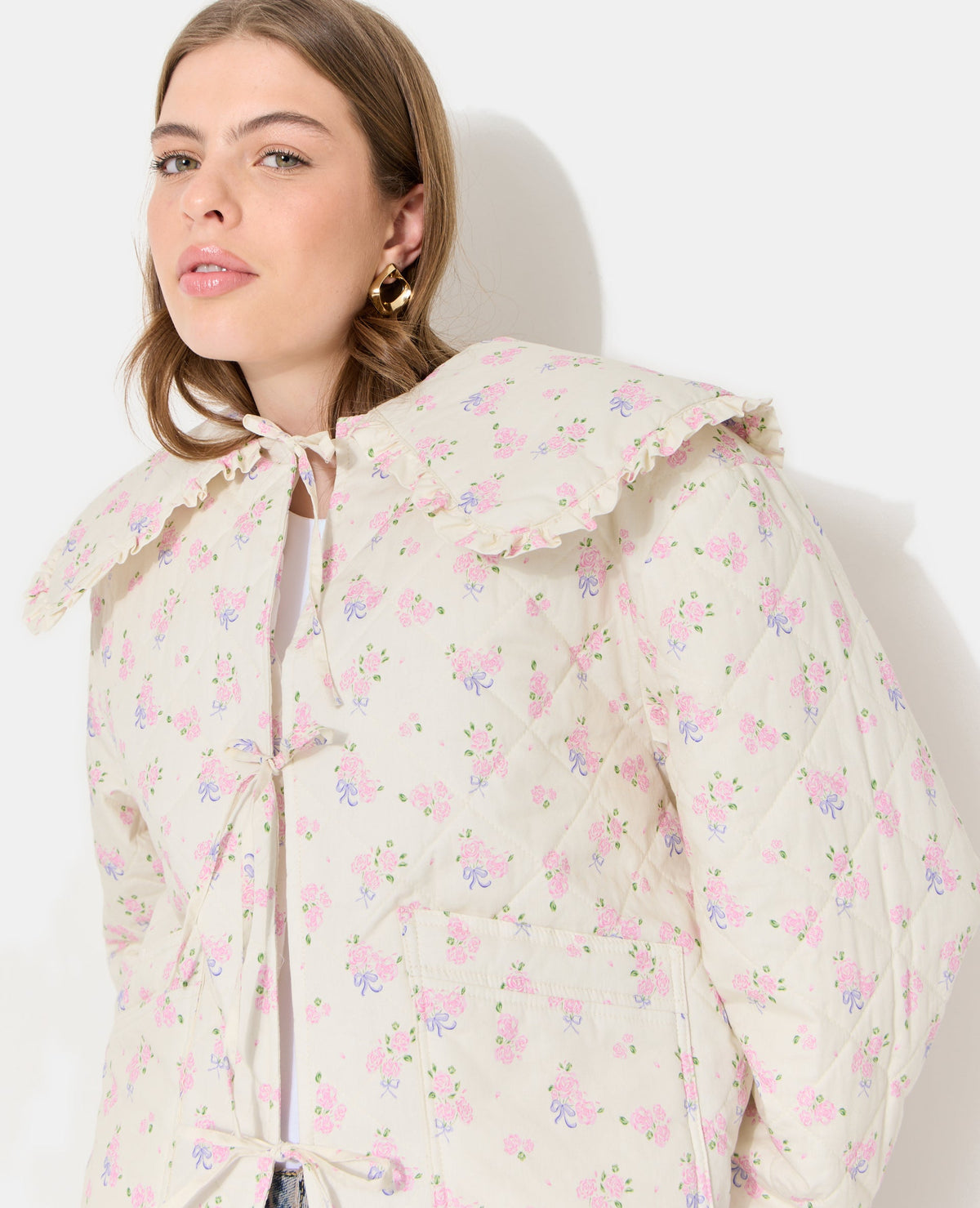 Veste matelassée motifs fleurs avec grand col