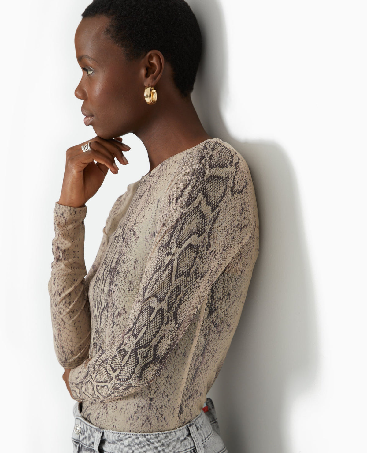 Top manches longues en résille motif python