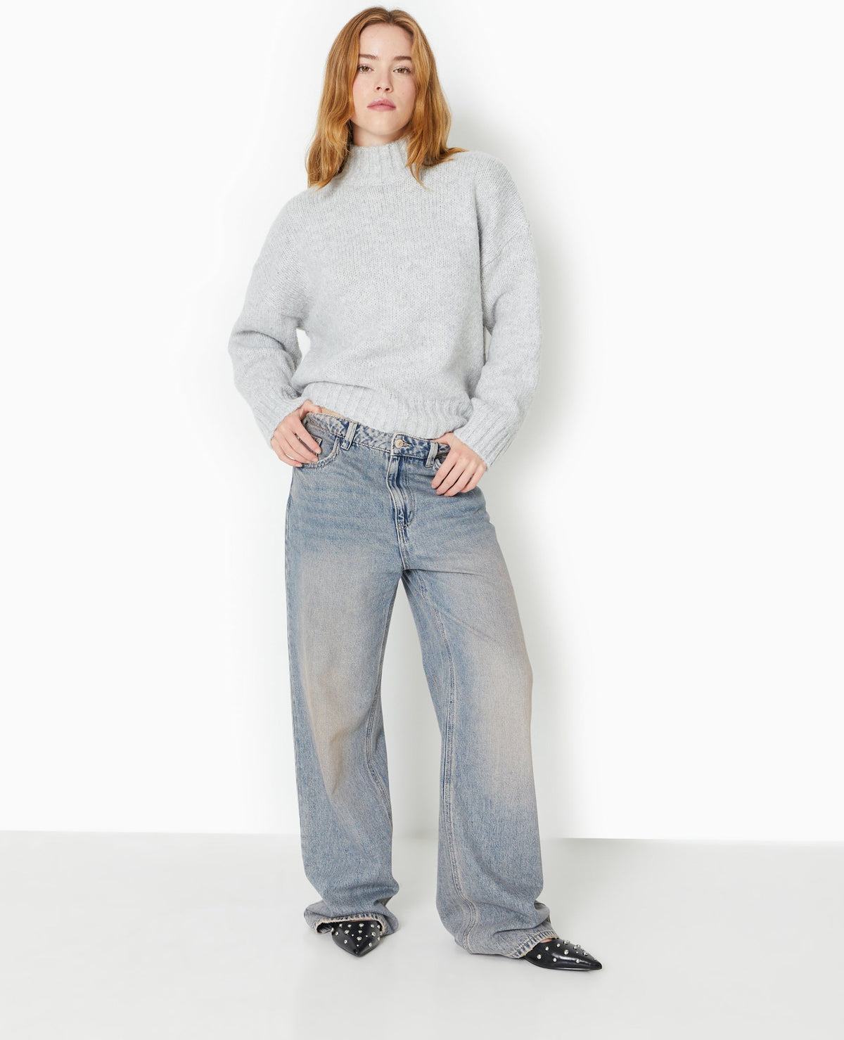 Pull col montant