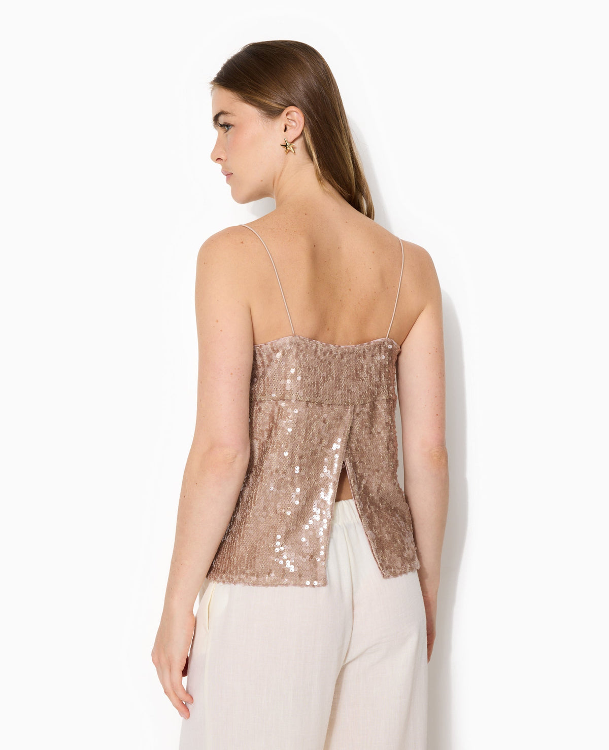 Top dos ouvert en maille ajourée avec sequins