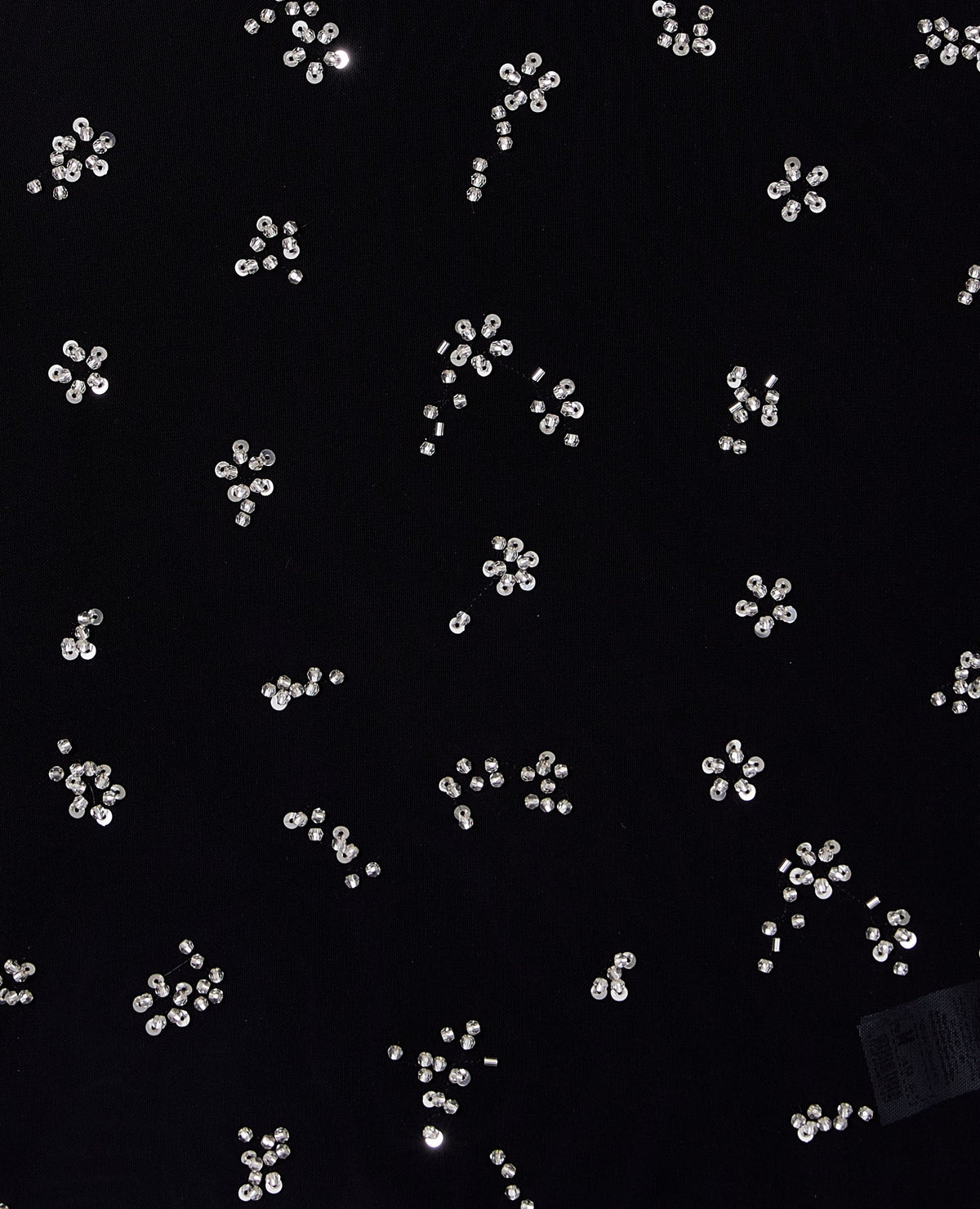 Top en résille avec perles et sequins