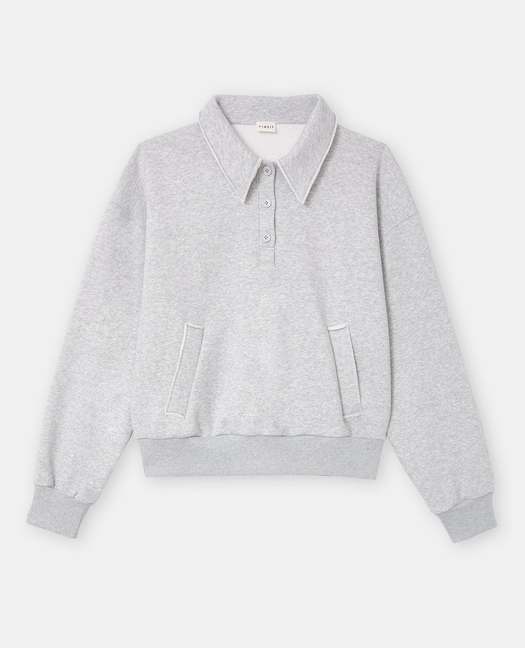 Sweat col polo avec poches et détails coupés