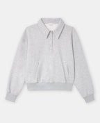 Sweat col polo avec poches et détails coupés