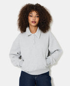 Sweat col polo avec poches et détails coupés