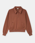 Sweat col polo avec poches et détails coupés