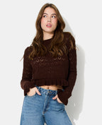 Pull en maille ajourée avec petits volants