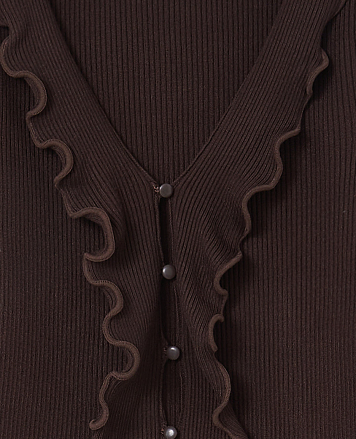 Gilet maille côtelée avec volants et bords ondulés