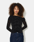 Top asymétrique en résille avec fleurs velours