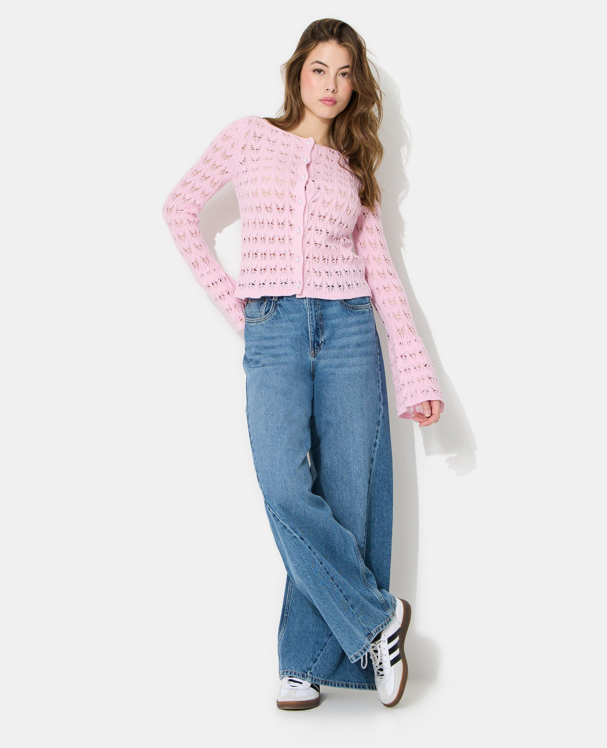 Gilet en maille ajourée avec boutons perles