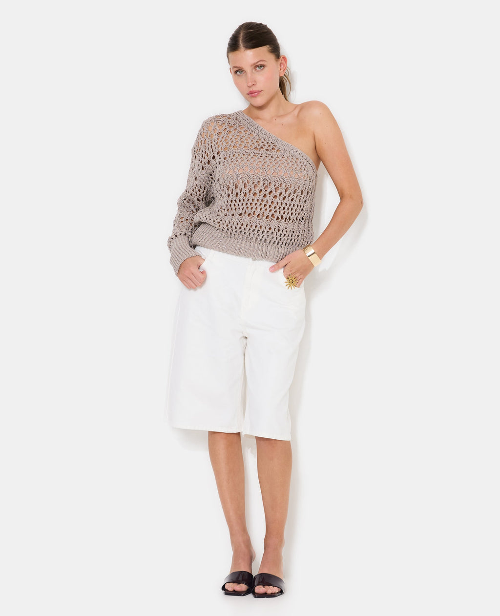 Pull asymétrique en maille ajourée