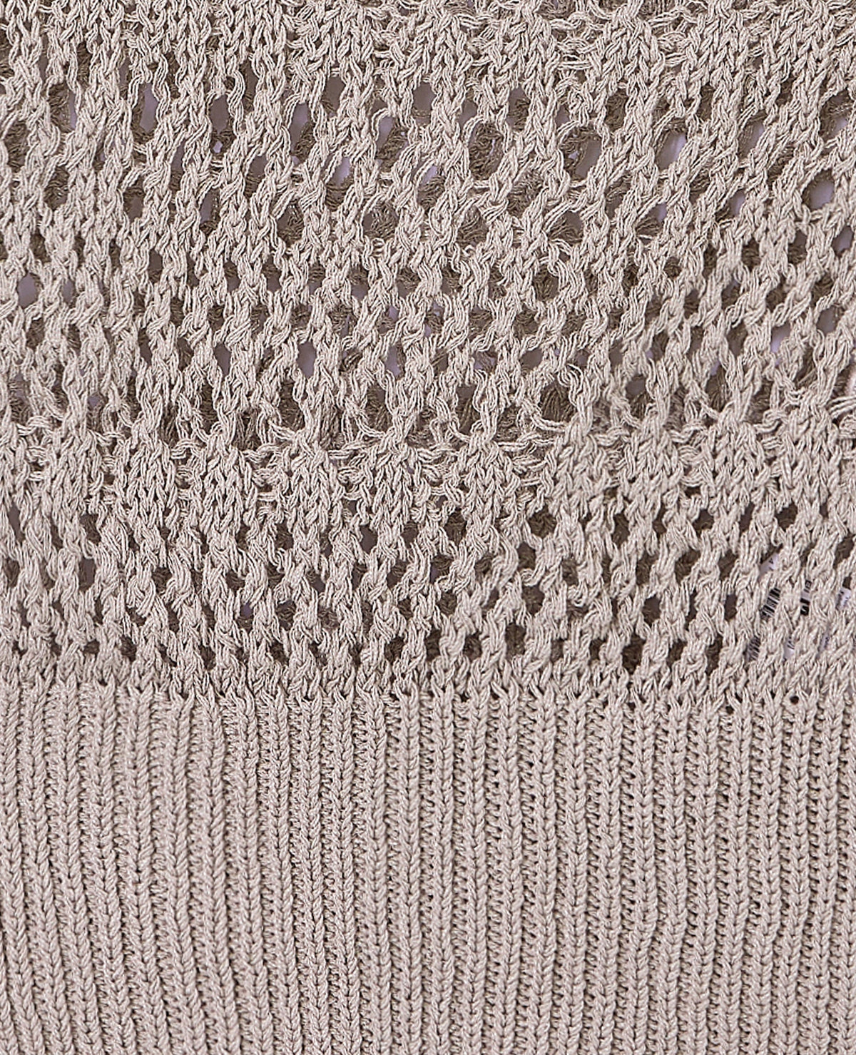 Pull asymétrique en maille ajourée