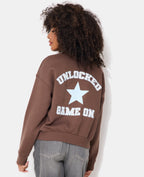 Sweat col rond avec print étoile et broderies dos