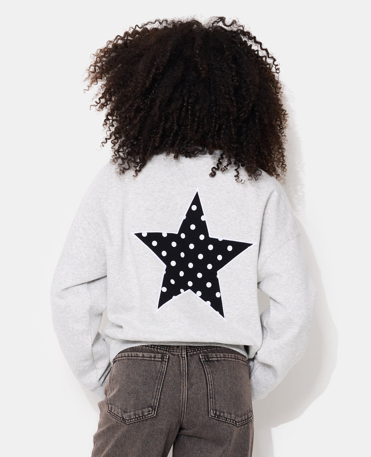 Sweat col rond avec print étoile et broderies dos
