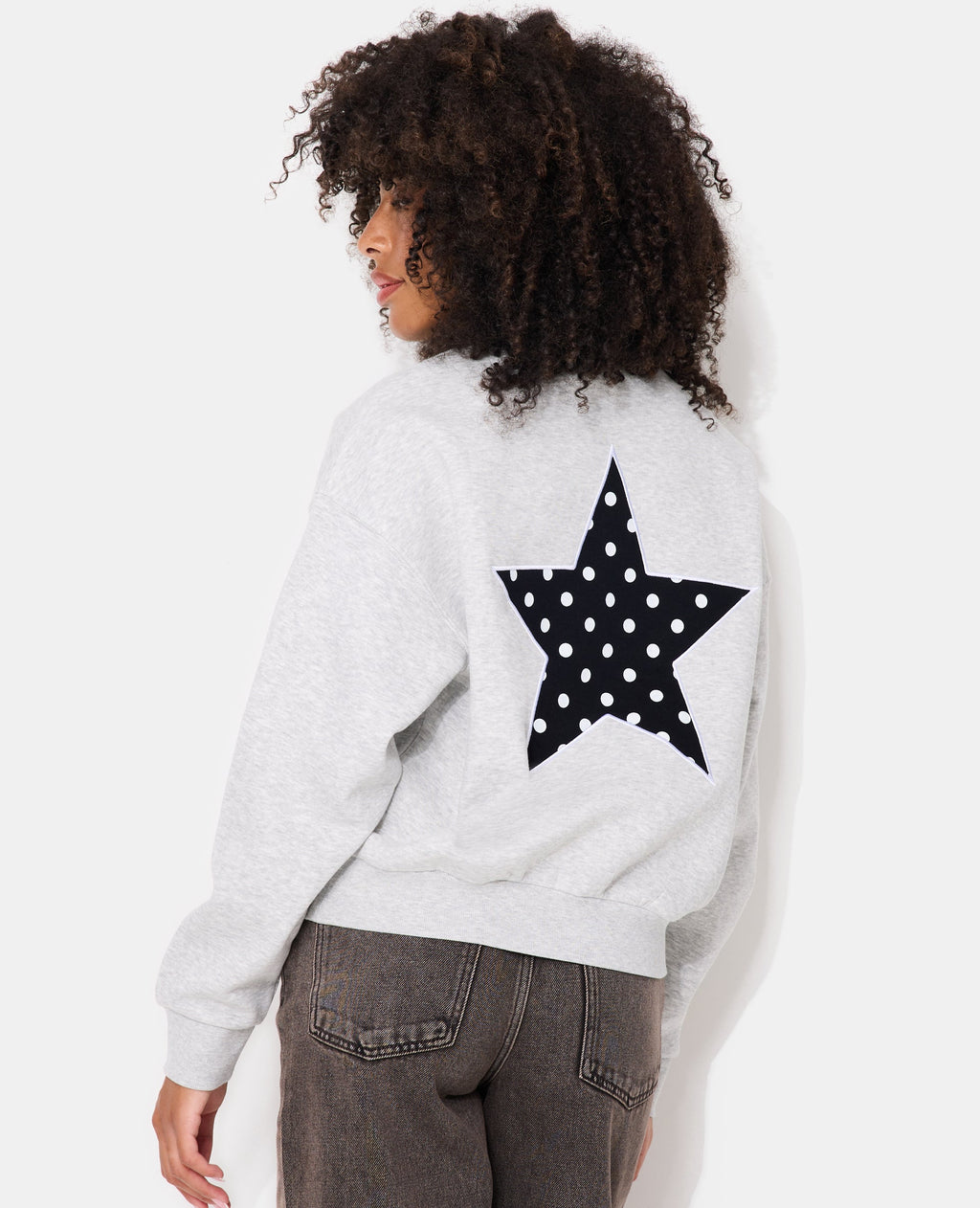 Sweat col rond avec print étoile et broderies dos