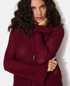 Top en dentelle avec manches flare et boutons