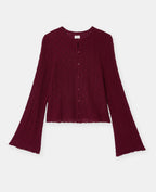 Top en dentelle avec manches flare et boutons