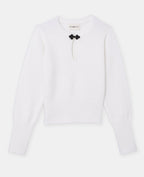 Pull avec goutte et boutonnière façon brandebourg