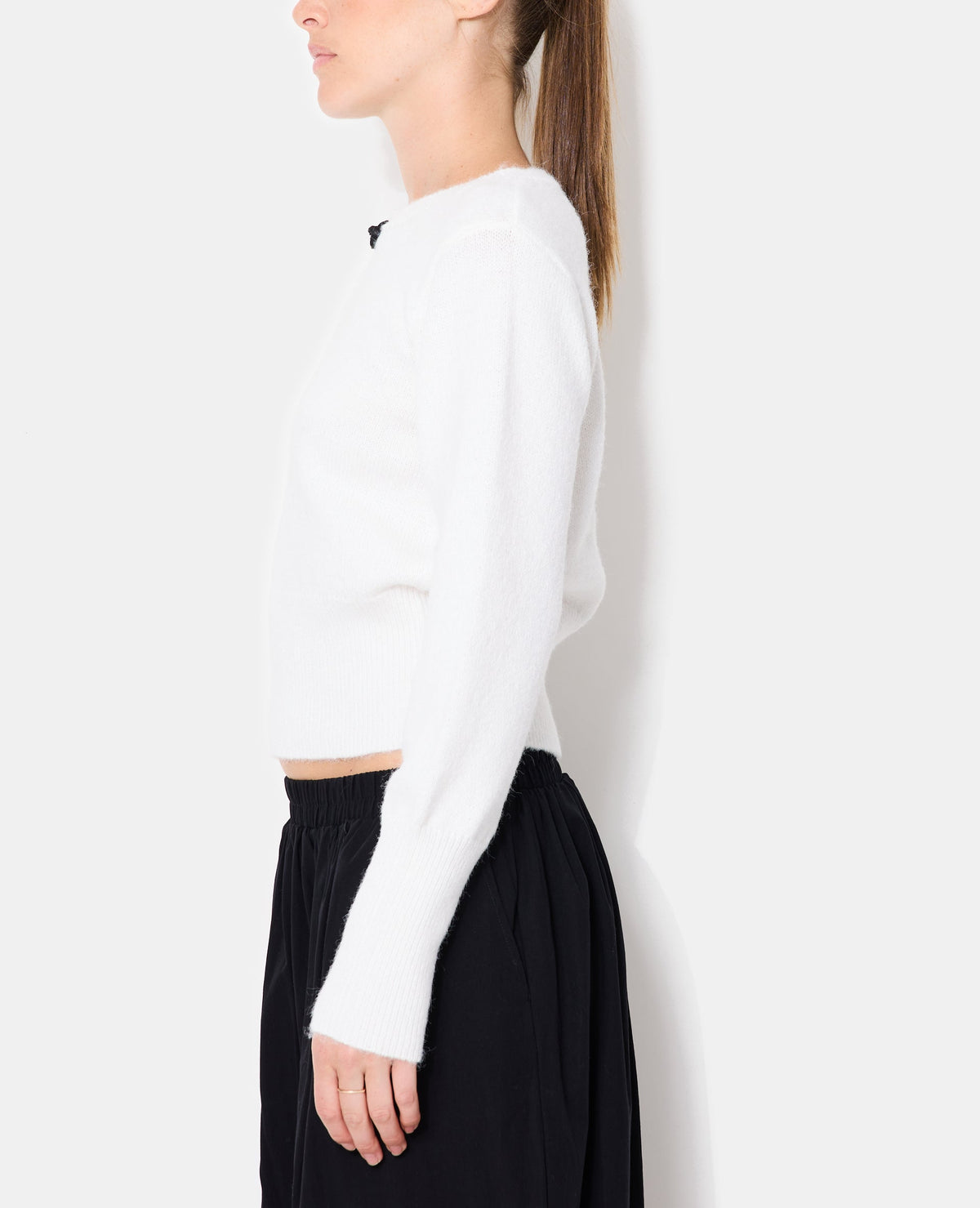 Pull avec goutte et boutonnière façon brandebourg